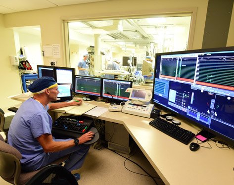 Provider viewing test results on a computer screen