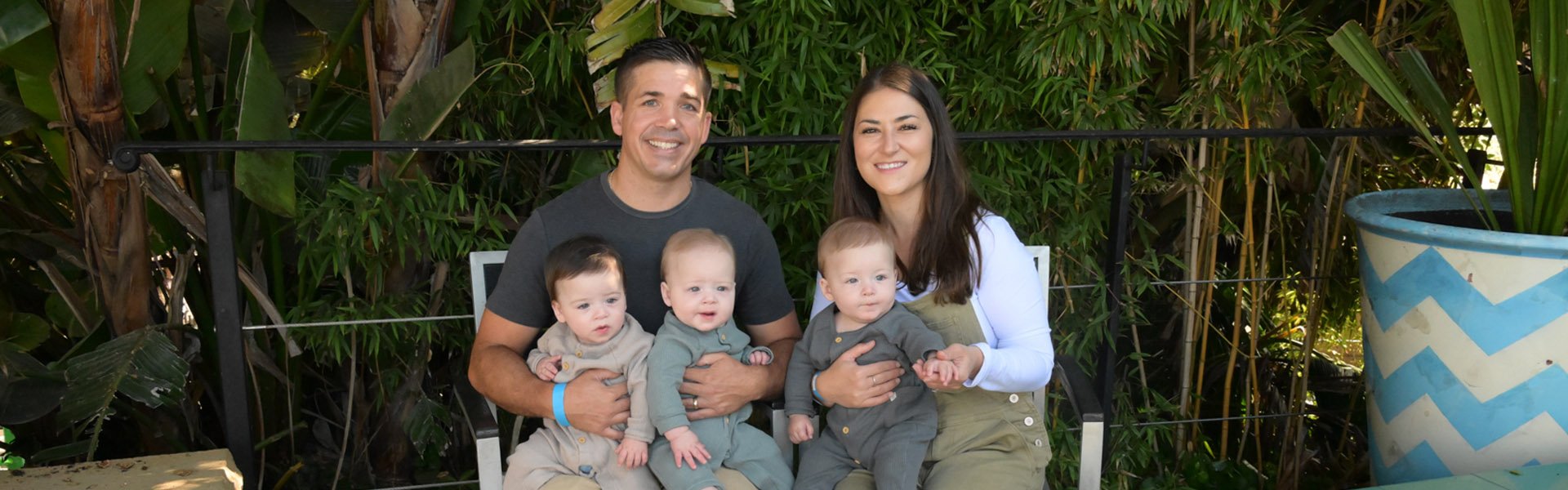 Tuck fmaily photo - father, mother, and triplets