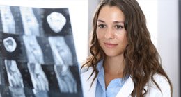 Health professional reviewing an imaging scan