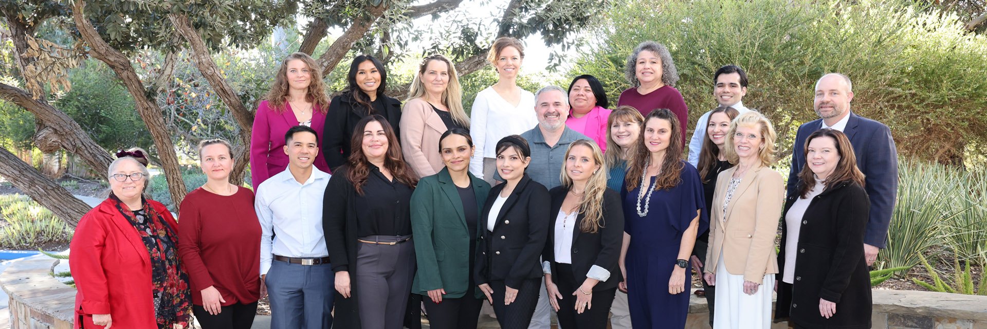 Group of Cottage Health employees smiling at the camera
