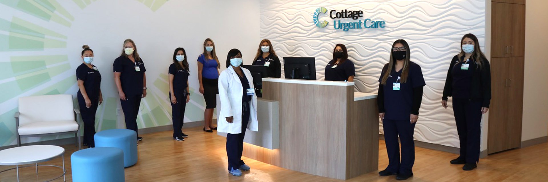 Staff standing in the Interior of a Cottage Urgent Care Center