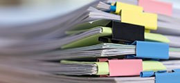 a stack of reference papers