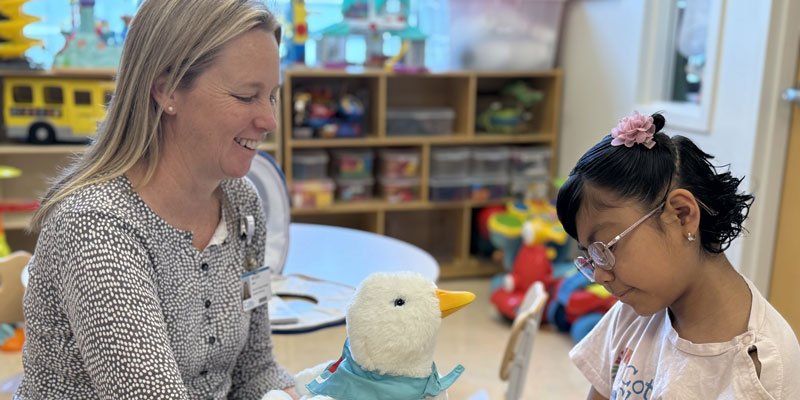Cottage Children's Medical Center - Certified Child Life Specialist assisting a child patient