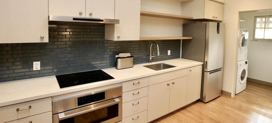 View of the kitchen at one of the Cottage Family Suites