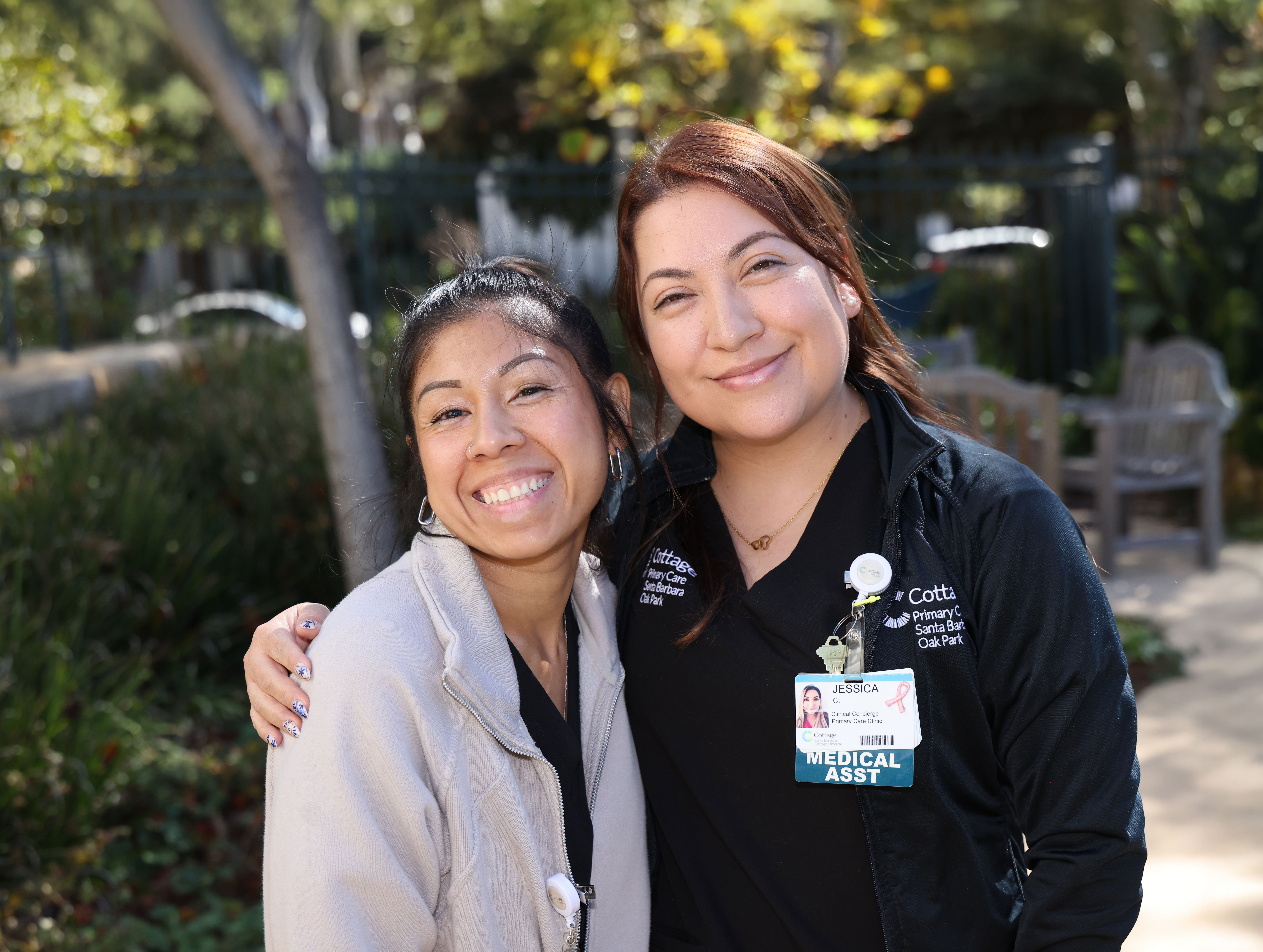 Nurses smiling toward the camera
