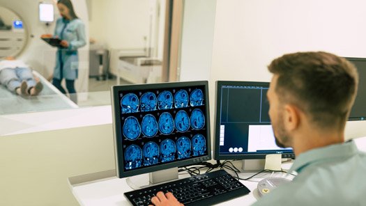 Imaging technologist review MRI scans
