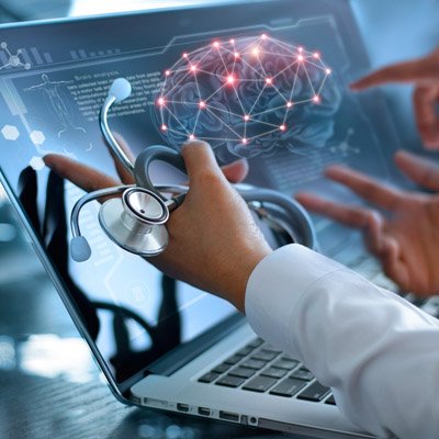 Providers reviewing scans on a computer screen