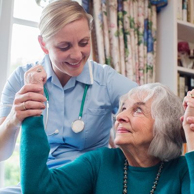Senior patient receiving a neurology treatment