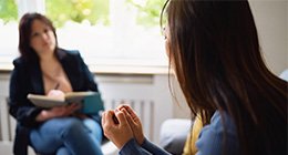 a medical professional attending therapy