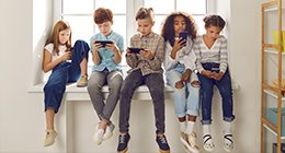 children using their phones