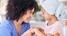 a young oncology patient with a nurse