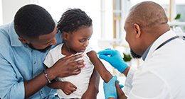 a girl receiving a vaccination