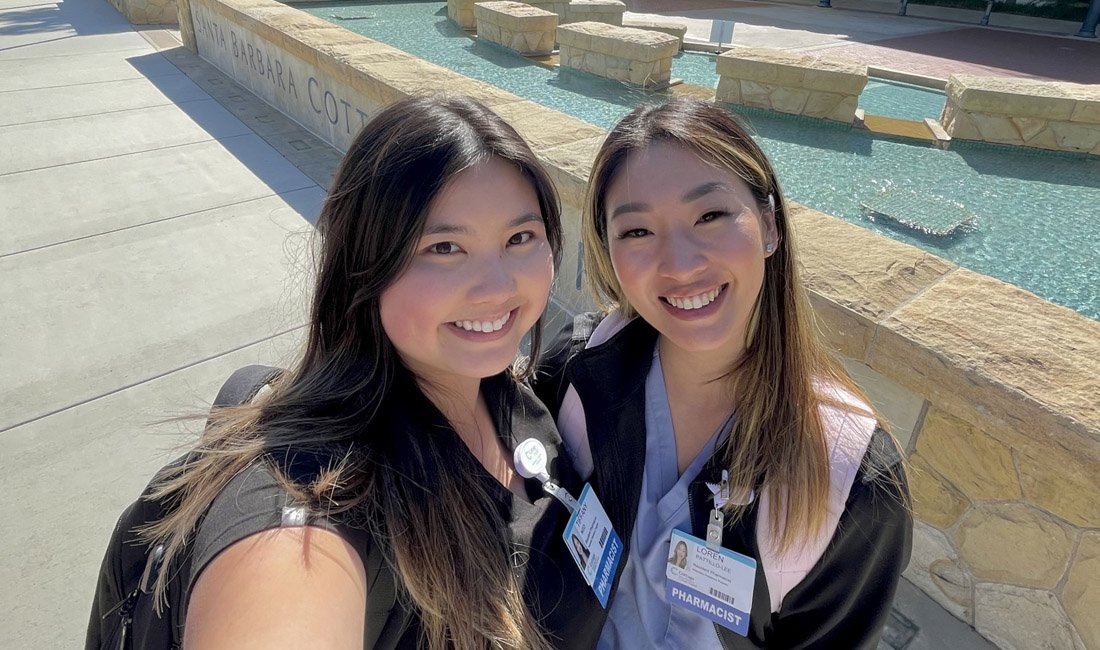 Two Cottage Health Pharmacy residents standing in front of Santa Barbara Cottage Hospital