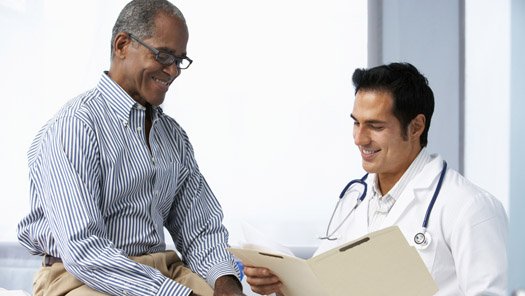 a provider reviewing a patient record with the patient