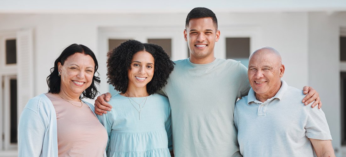 Adults smiling at the camera