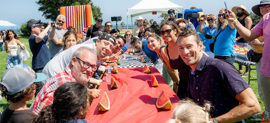 Cottage employees and families enjoying the food at the employee picnic