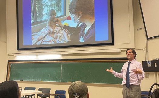 Dr. Jeffrey Frazier presnting in front of a classroom