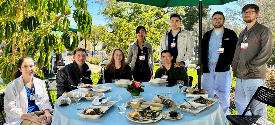 Residents enjoying lunch outdoors