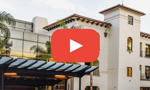 Santa Barbara Cottage Hospital with a play button icon