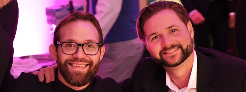 Kyle McKittrick and his brother seated at the Tiara Ball